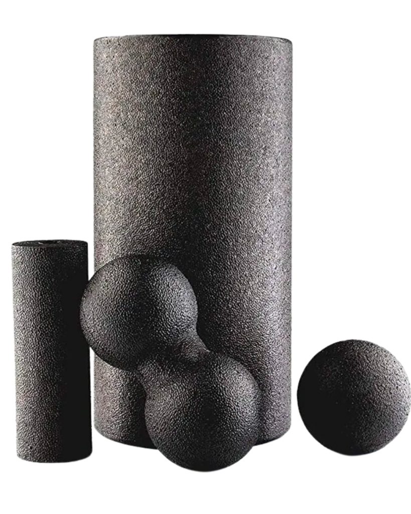 Black 4-piece foam roller set on a white background