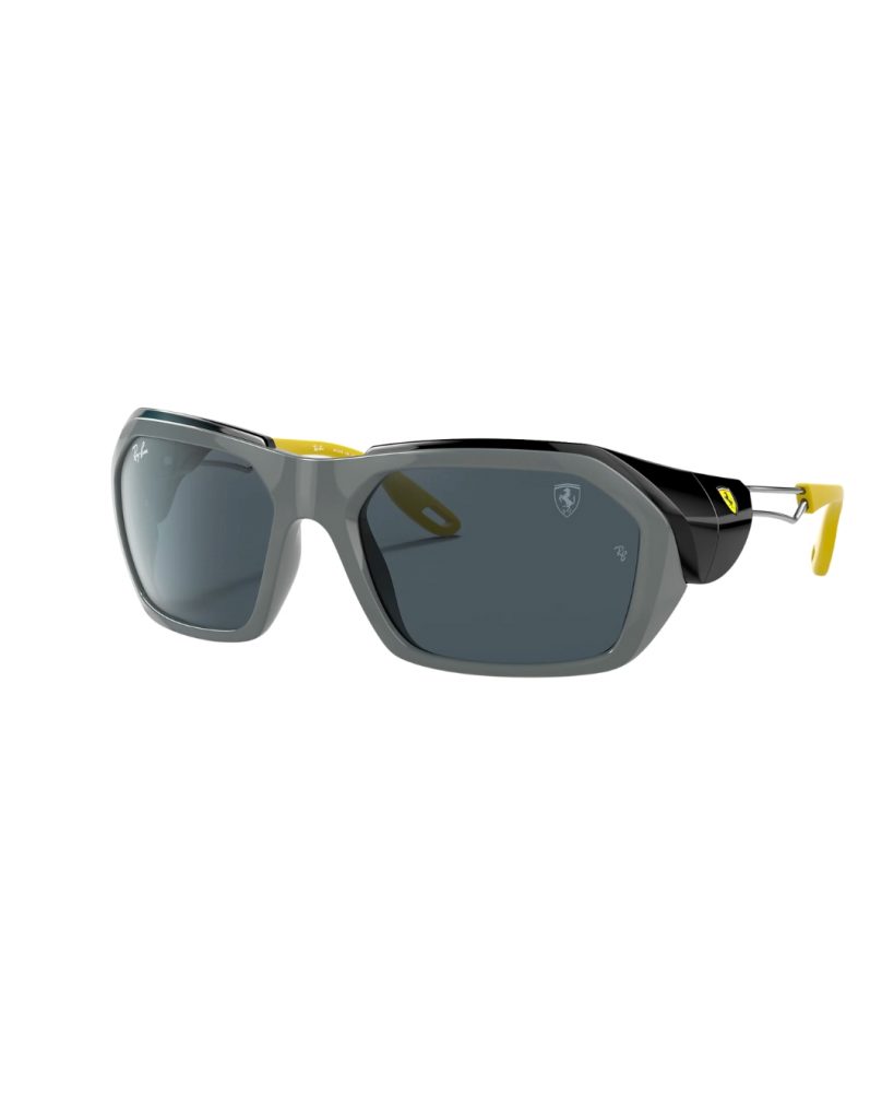 Gray, black, and yellow Ray-Ban RB4367M Sunglasses on a white background. 